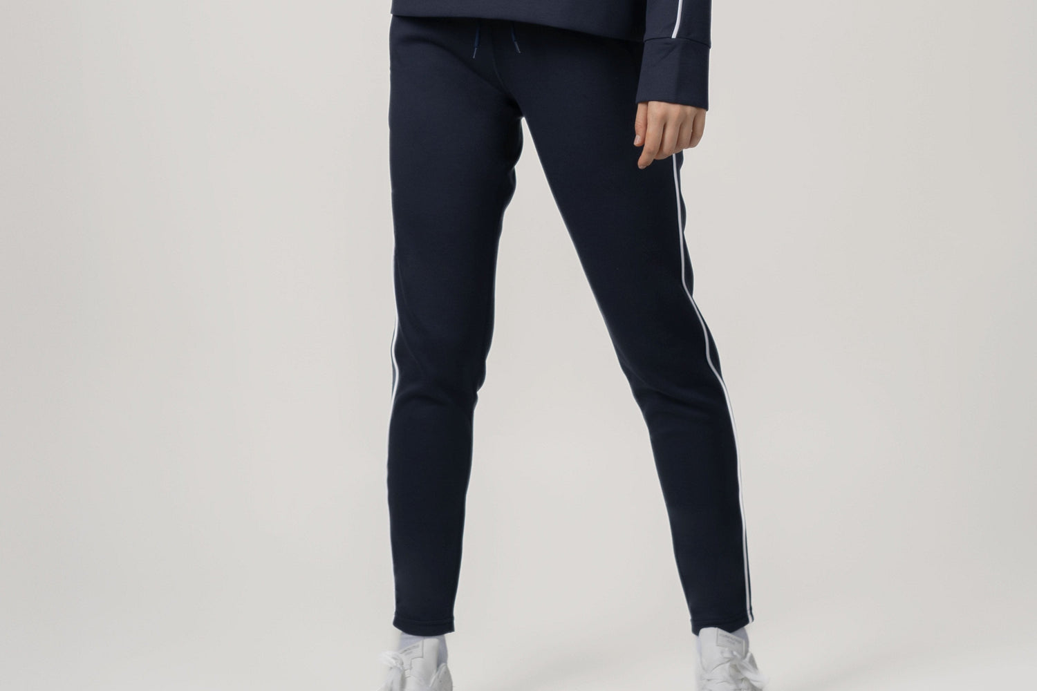 WOMEN IN NAVY SWEATPANTS